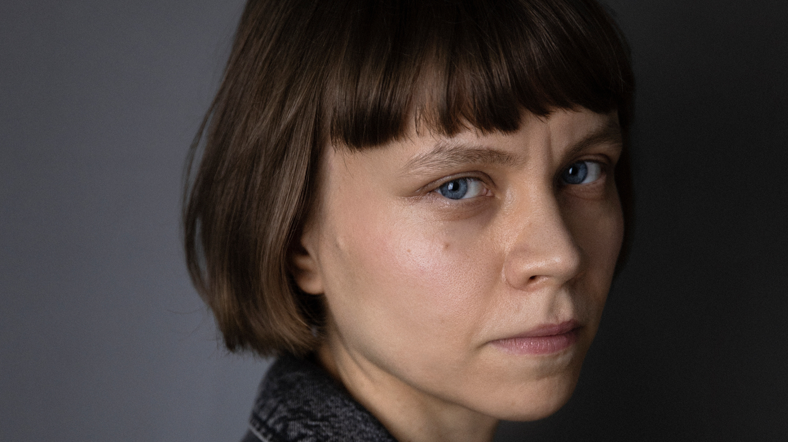 Kuvassa on Mariia Niskavaaran kasvokuva. Hänellä on ruskea polkkatukka.